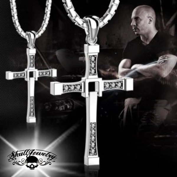 Dominic Toretto wearing his iconic silver cross necklace